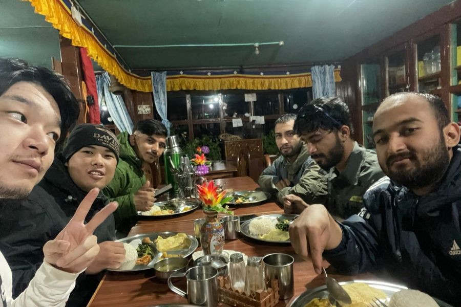 Trekkers dining together in teahouse on Langtang Gosaikunda trek
